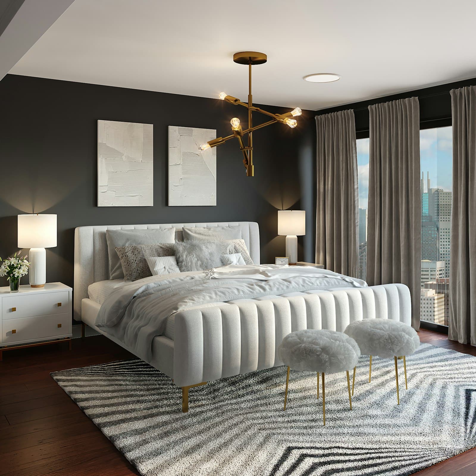A penthouse bedroom with a city view