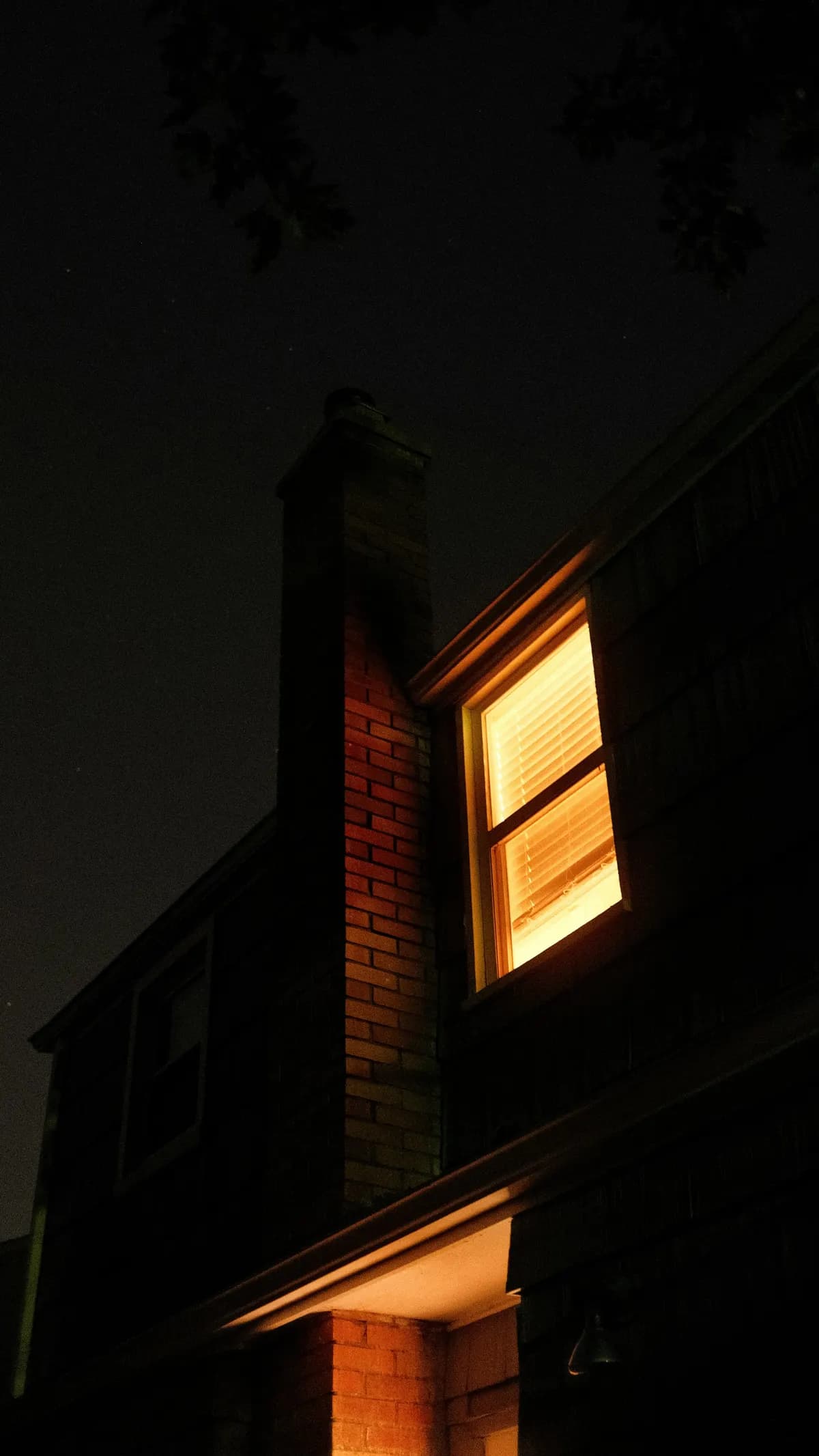 An East End estate at night, quietly monitored while the owners are away