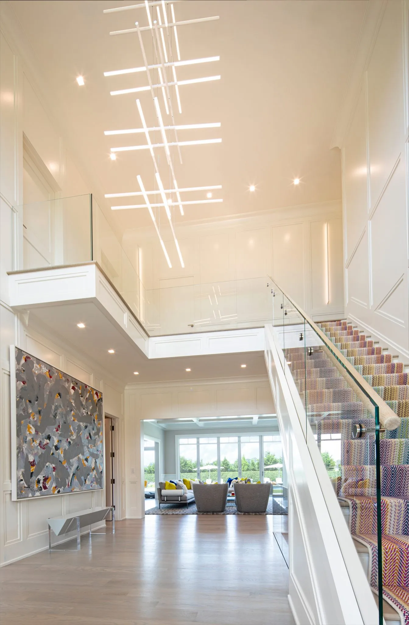 The double-height foyer and staircase