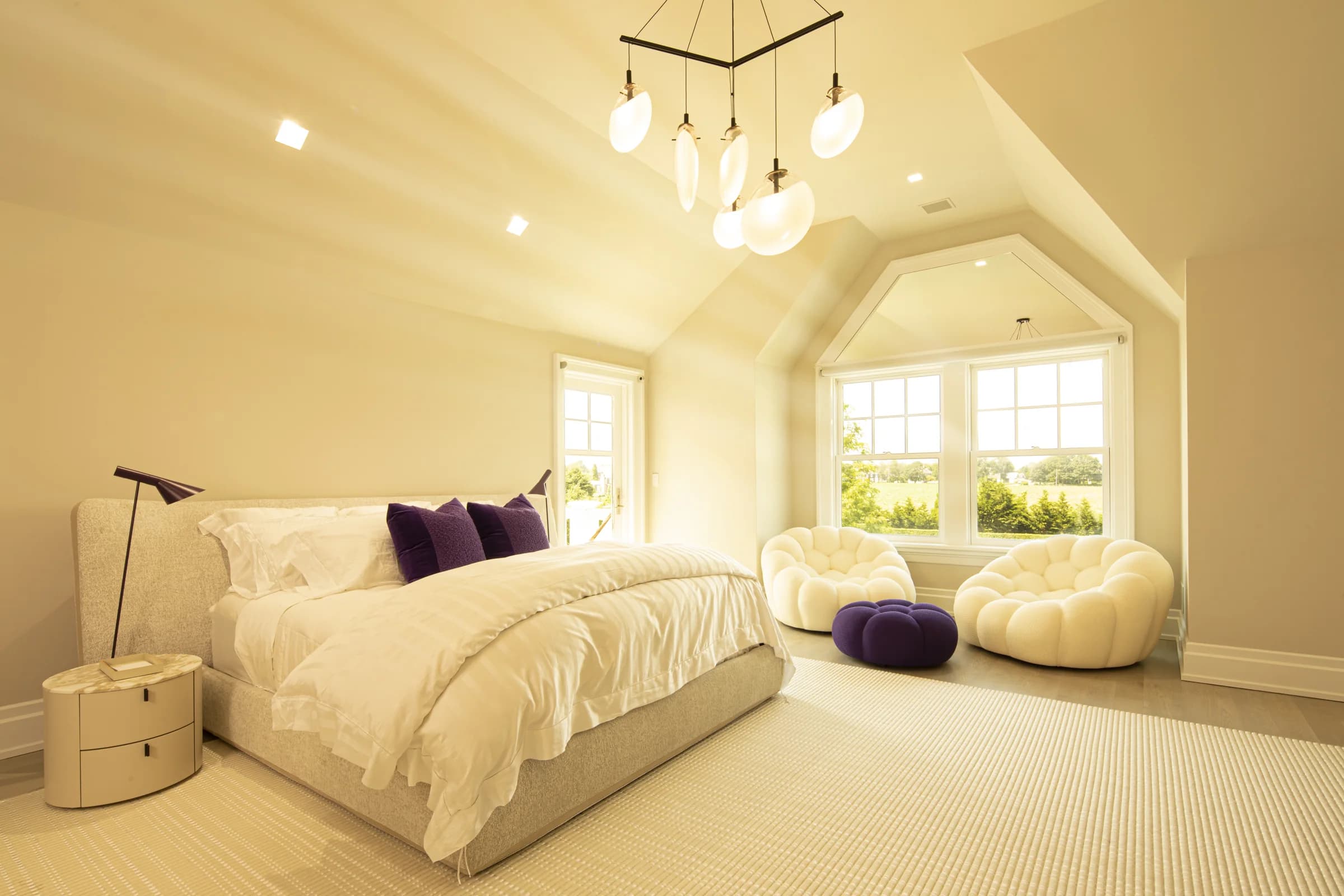 The master suite in warm morning light