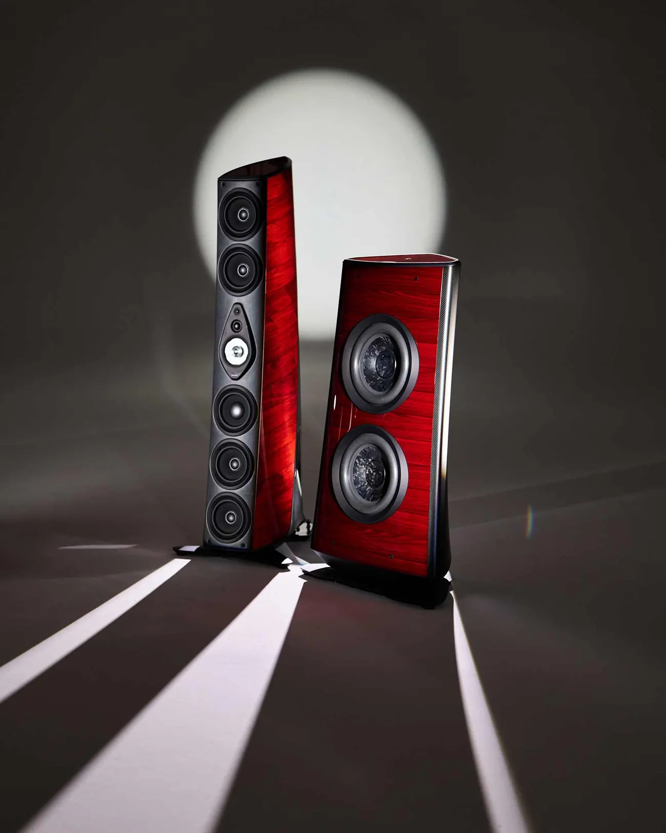 The Sonus Faber Suprema flagship loudspeakers, spotlit like sculpture