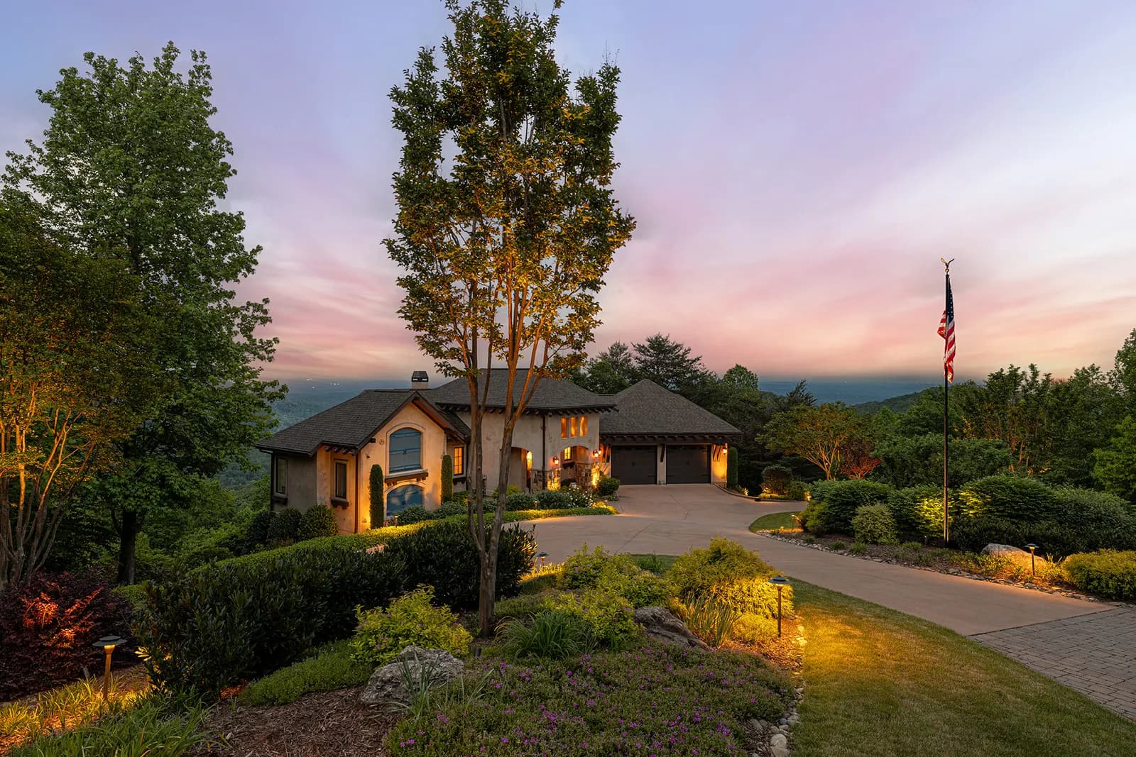 An estate lit to the ridgeline with Coastal Source landscape lighting