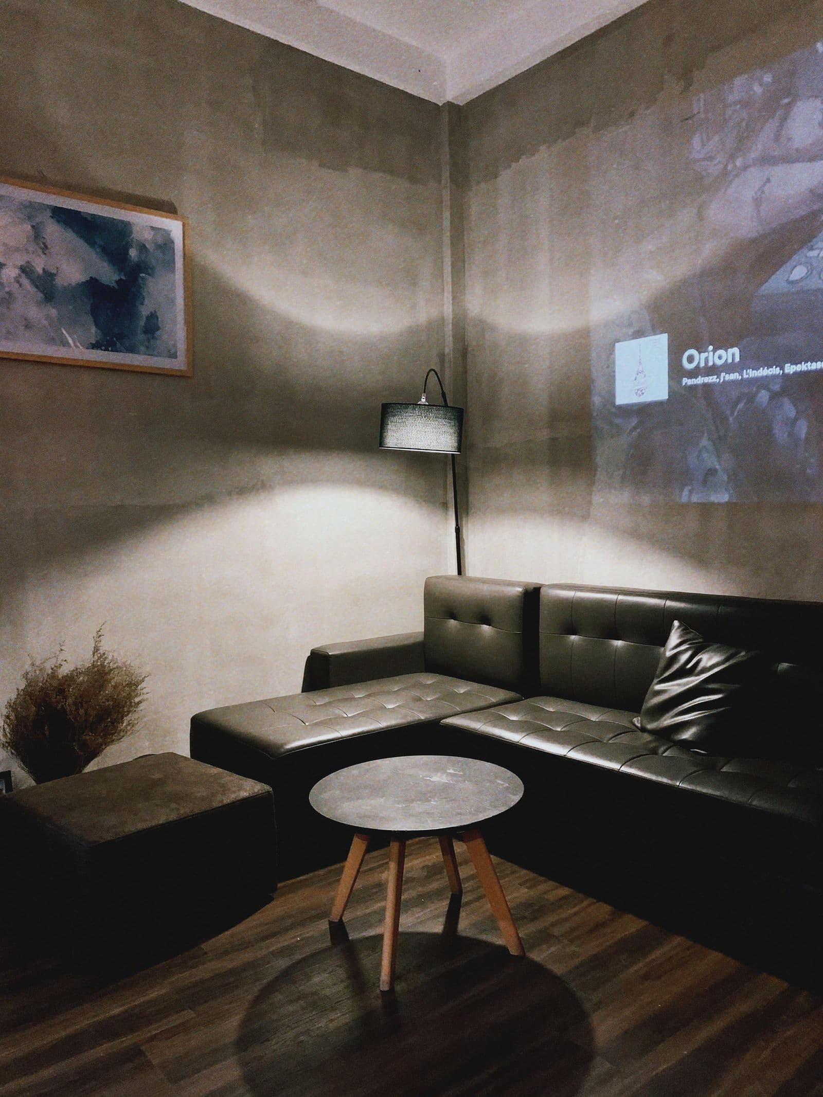 A media room dimmed for a film, one of the scenes the house already knows