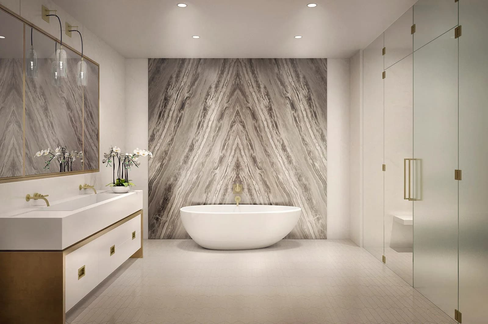 A primary bath finished in bookmatched marble