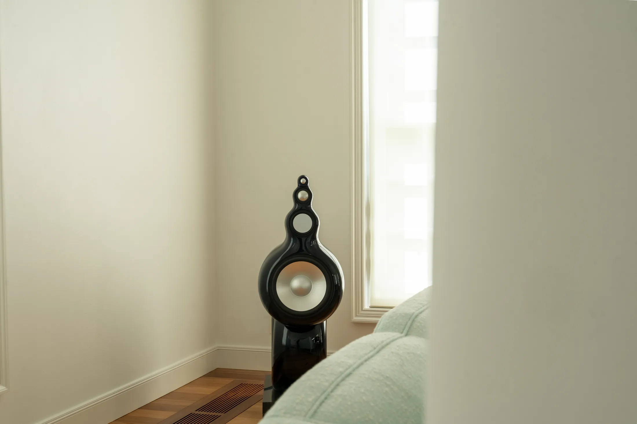 A pair of Bowers & Wilkins Nautilus speakers in the living room