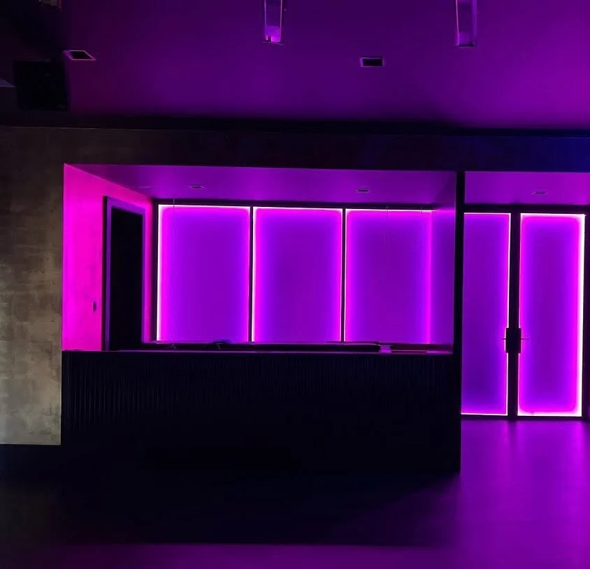 The home club in color, translucent panels washed in magenta